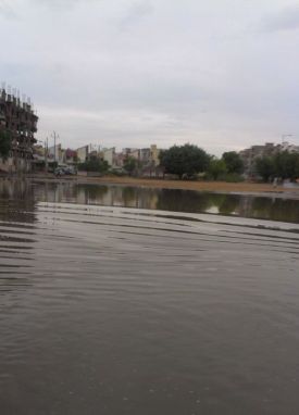 ground turned in pool with rain water - Karachi Rain